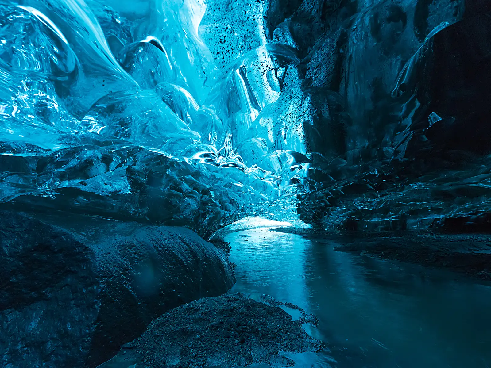 Exploration of ice cave at Vatnajokull glacier by Arctic Exped Exploration of ice cave at Vatnajokull glacier by Arctic Exped